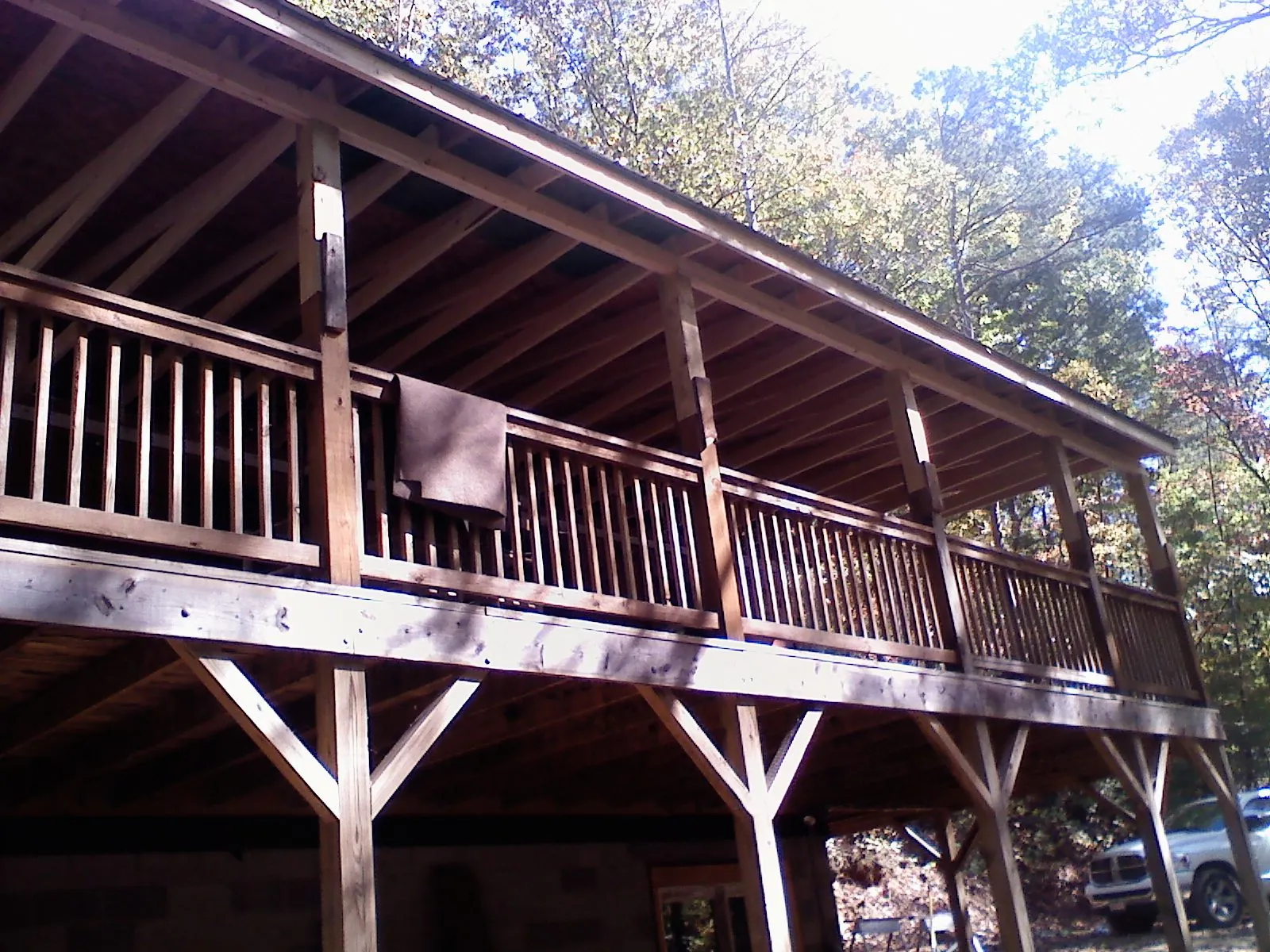 Timber framing under a new elevated porch and deck — Roof Leak Repair in San Jose by Roofing Brothers
